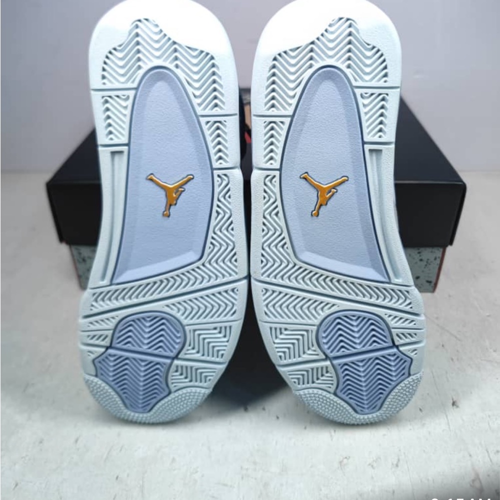 Air Jordan Sneakers with Gold and Gray Accents